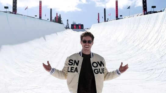 Shaun White poses in the halfpipe after finals of the inaugural Snow League event at Buttermilk Ski Resort in Aspen, Colorado.