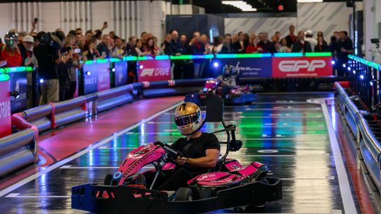 2009 Formula 1 World Champion Jenson Button, slides his kart to the side as he crosses the finish line in first place in the Ceremonial First Race, during a preview event at the Formula 1 experience at Grand Prix Plaza, the home to the Las Vegas Grand Prix, in Las Vegas, Nevada, Friday, March. 28, 2025. 2009 Formula 1 World Champion Jenson Button, slides his kart to the side as he crosses the finish line in first place in the Ceremonial First Race, during a preview event at the Formula 1 experience at Grand Prix Plaza, the home to the Las Vegas Grand Prix, in Las Vegas, Nevada, Friday, March. 28, 2025.
